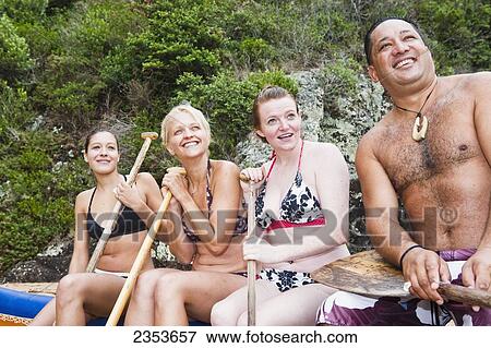 Stock Photo - Preparing To See The Islands In An Outrigger Canoe With A Maori Guide In The Bay Of Islands; New Zealand. Fotosearch