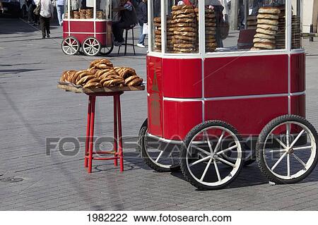 Stock Image - Pretzel Vendor In Taksim Square; Istanbul Turkey. Fotosearch