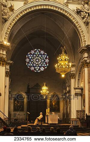 Priest Sitting In Chair During Service In Church; Valencia, Spain View Large Photo Image Stock Photography - Priest Sitting In Chair During Service In Church; Valencia, Spain. Fotosearch