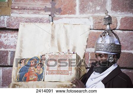 Priest with crown and holy book, Nakuta Laab monastery, near Lalibela; Amhara region, Ethiopia View Large Photo Image Stock Image - Priest with crown and holy book, Nakuta Laab monastery, near Lalibela; Amhara region, Ethiopia. Fotosearch