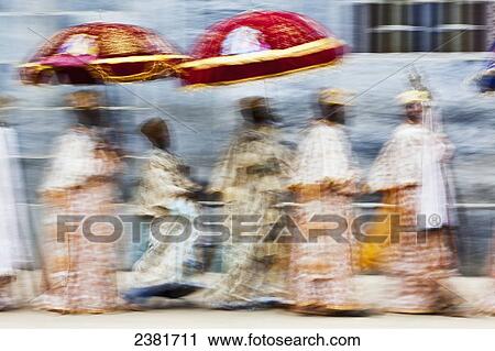 Priests parading copies of the Tabot (the tablets of stone) during Timkat (Epiphany) outside The Church of Our Lady Mary of Zion; Axum, Tigray, Ethiopia View Large Photo Image Stock Image - Priests parading copies of the Tabot (the tablets of stone) during Timkat (Epiphany) outside The Church of Our Lady Mary of Zion; Axum, Tigray, Ethiopia. Fotosearch