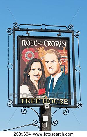 Picture - Prince William And Catherine, Duchess Of Cambridge Painted On Pub Sign At High Street; Tilshead, Wiltshire, England, Uk. Fotosearch