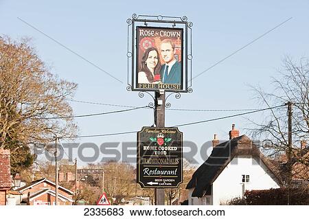 Prince William And Catherine, Duchess Of Cambridge Painted On Pub Sign At High Street; Tilshead, Wiltshire, England, Uk View Large Photo Image Stock Image - Prince William And Catherine, Duchess Of Cambridge Painted On Pub Sign At High Street; Tilshead, Wiltshire, England, Uk. Fotosearch