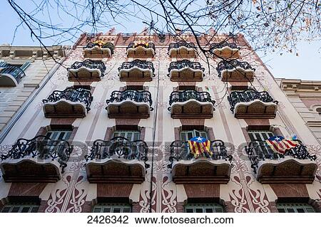 Stock Image - Pro-independence flags in a modernist building in Gracia; Barcelona, Catalonia, Spain. Fotosearch