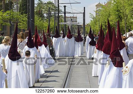 Stock Image - Procession during Semana Santa; Seville, Spain. Fotosearch
