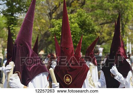 Stock Image - Procession during Semana Santa; Seville, Spain. Fotosearch