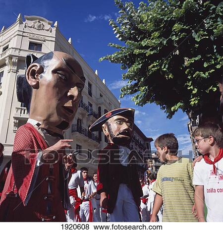Stock Photo - Procession Of Giants And Giant Heads. Fotosearch