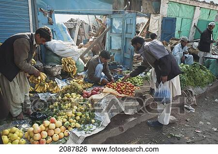 Produce For Sale In Front Of The Bazaar Destroyed By The 8 October 2005 Earthquake, Muzaffarabad, Azad Kashmir, Pakistan View Large Photo Image Stock Photograph - Produce For Sale In Front Of The Bazaar Destroyed By The 8 October 2005 Earthquake, Muzaffarabad, Azad Kashmir, Pakistan. Fotosearch
