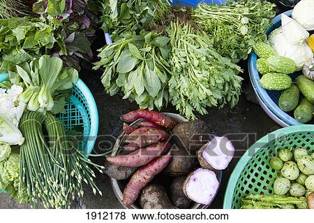 Produce On Sale In Market At Chau Doc, Mekong Delta, Vietnam View Large Photo Image Stock Photo - Produce On Sale In Market At Chau Doc, Mekong Delta, Vietnam. Fotosearch