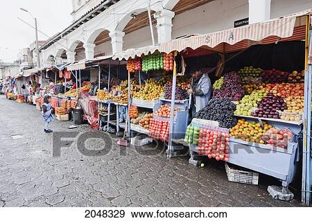 Produce Vendors At The Saturday Market, Otavalo, Imbabura, Ecuador View Large Photo Image Stock Photo - Produce Vendors At The Saturday Market, Otavalo, Imbabura, Ecuador. Fotosearch