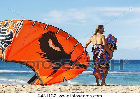 Stock Photo - Professional kiteboarder Niccolo Porcella kiteboarding on the north shore of Maui; Maui, Hawaii, United States of America. Fotosearch
