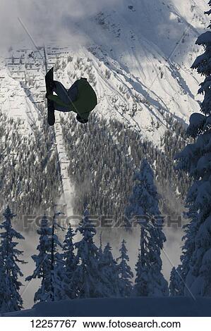 Stock Photo - Professional snowboarder, Frederik Kalbermatten, in the Arlberg mountains, Austria. Fotosearch