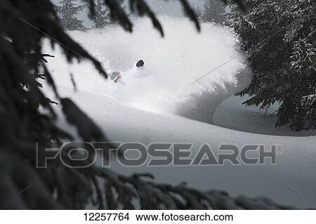 Professional snowboarder, Marko Grilc, in the Arlberg mountains, Austria View Large Photo Image Picture - Professional snowboarder, Marko Grilc, in the Arlberg mountains, Austria. Fotosearch