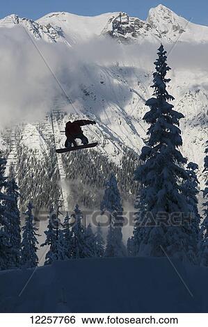 Stock Photograph - Professional snowboarder, Marko Grilc, in the Arlberg mountains, Austria. Fotosearch