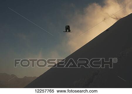 Stock Photography - Professional snowboarder, Marko Grilc, in the Arlberg mountains, Austria. Fotosearch