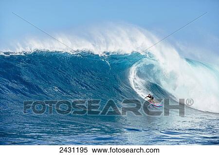 Professional surfer Albee Layer paddling into large waves at the infamous big wave spot know as Jaws or Peahi; Maui, Hawaii, United States of America View Large Photo Image Stock Photography - Professional surfer Albee Layer paddling into large waves at the infamous big wave spot know as Jaws or Peahi; Maui, Hawaii, United States of America. Fotosearch