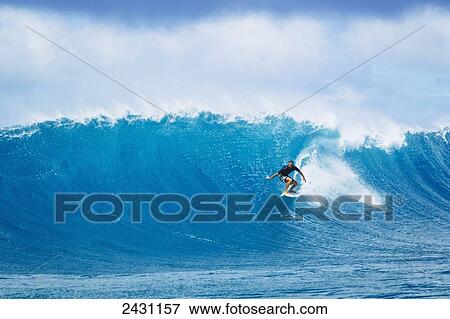 Professional surfer Jesse Richman gets barrelled on beautiful blue wave on Maui's North shore; Maui, Hawaii, United States of America View Large Photo Image Stock Photo - Professional surfer Jesse Richman gets barrelled on beautiful blue wave on Maui's North shore; Maui, Hawaii, United States of America. Fotosearch