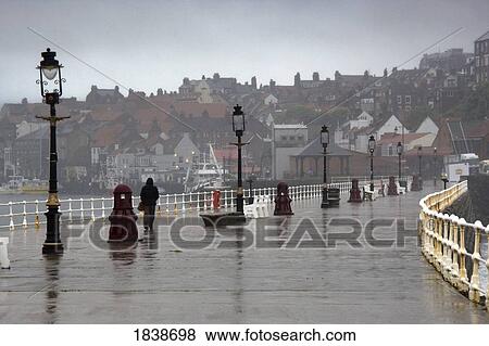 Promenade And Whitby Townscape; North Yorkshire, England, Uk View Large Photo Image Stock Photo - Promenade And Whitby Townscape; North Yorkshire, England, Uk. Fotosearch