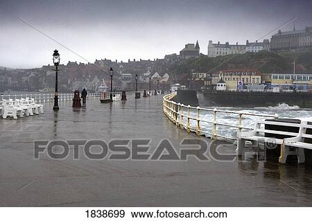 Promenade And Whitby Townscape; North Yorkshire, England, Uk View Large Photo Image Stock Photo - Promenade And Whitby Townscape; North Yorkshire, England, Uk. Fotosearch