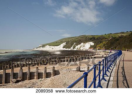 Stock Photo - Promenade, Groynes And Beachy Head; Eastbourne, Sussex, England. Fotosearch