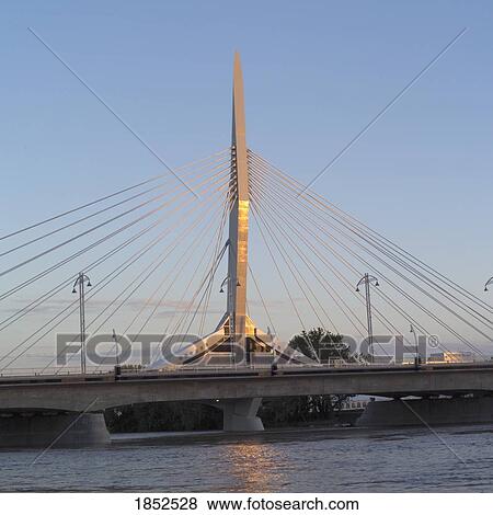 Provencher Bridge Across The Red River In Winnipeg, Manitoba, Canada View Large Photo Image Stock Photo - Provencher Bridge Across The Red River In Winnipeg, Manitoba, Canada. Fotosearch