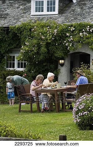 Pub lunch in the front garden at The Stackpole Inn. Stackpole. Pembrokeshire. Wales. Cymru. UK. United Kingdom. View Large Photo Image Stock Photography - Pub lunch in the front garden at The Stackpole Inn. Stackpole. Pembrokeshire. Wales. Cymru. UK. United Kingdom.. Fotosearch