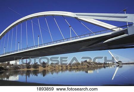 Stock Photo - Puente De La Barqueta And Puente Del Alamillo Over Guadalquivir River. Fotosearch