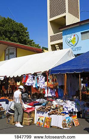 Puerto Corinto, Chinandega, Nicaragua, Central America; Shopper In Outdoor Craft Market View Large Photo Image Stock Photo - Puerto Corinto, Chinandega, Nicaragua, Central America; Shopper In Outdoor Craft Market. Fotosearch