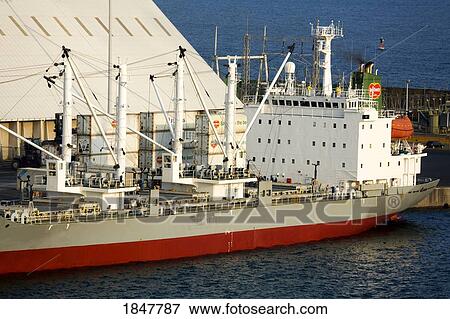 Stock Photo - Puerto Quetzal, Guatemala, Central America; Moored Freighter In Port. Fotosearch