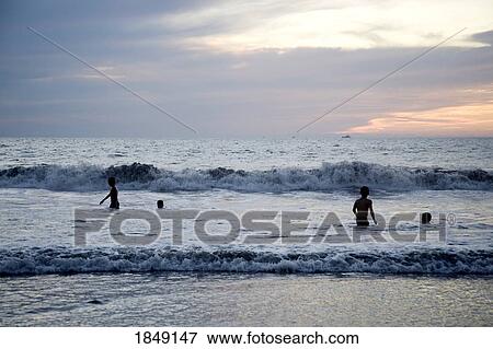 Stock Photo - Puerto Vallarta, Mexico; People Playing In The Ocean. Fotosearch