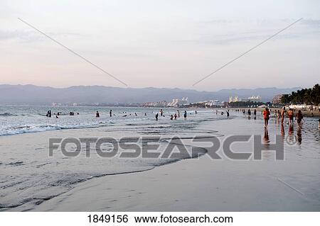 Stock Photograph - Puerto Vallarta, Mexico; People Enjoying The Seashore. Fotosearch