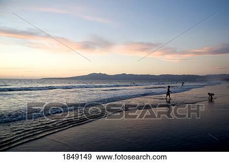 Stock Photo - Puerto Vallarta, Mexico; People Walking Along Seashore. Fotosearch