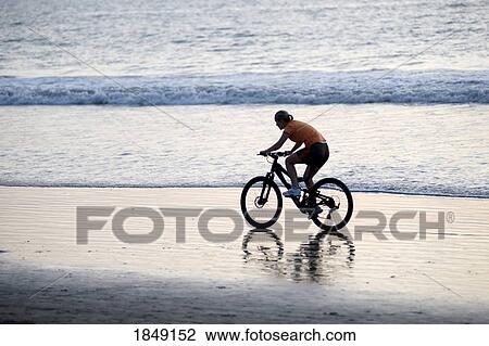Puerto Vallarta, Mexico; Woman Cycling On Beach View Large Photo Image Stock Image - Puerto Vallarta, Mexico; Woman Cycling On Beach. Fotosearch