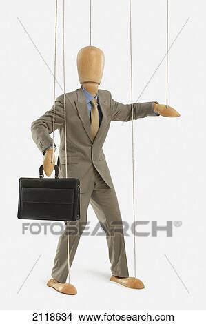 Picture - Puppet Dressed As A Businessman. Fotosearch