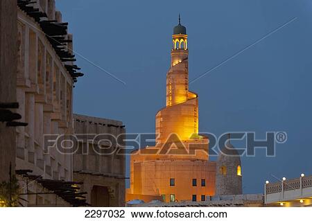 Stock Image - Qatar, View of Qatar Islamic Culture Center and mosque (Fanar) at dusk; Doha. Fotosearch