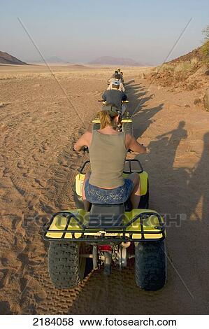 Quad Biling In The Namib Desert Namibia View Large Photo Image Stock Photo - Quad Biling In The Namib Desert Namibia. Fotosearch
