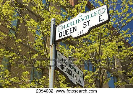 Stock Image - Queen St. East And Brooklyn Av. Street Signs, Leslieville, Toronto, Ontario. Fotosearch