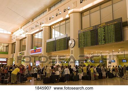 Stock Photo - Queue To Check In Desk At Airport; Malaga, Costa Del Sol, Spain. Fotosearch