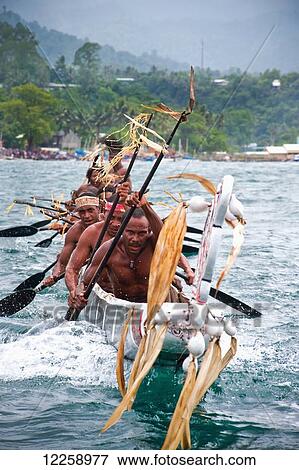 Racing in the Milne Bay Canoe Festival; Alatou, Milne Bay, Papua New Guinea View Large Photo Image Stock Photo - Racing in the Milne Bay Canoe Festival; Alatou, Milne Bay, Papua New Guinea. Fotosearch