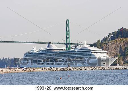 Stock Image - Radiance of the Seas passing under the Lions Gate Bridge, West Vancouver, British Columbia, Canada. Fotosearch