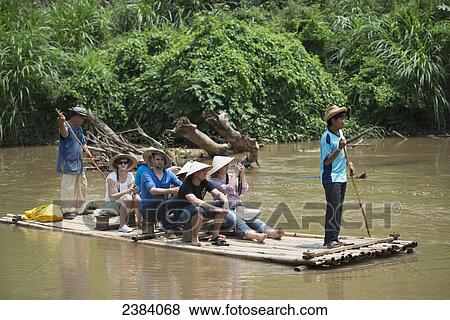 Rafting down the river; Chiang Mai, Thailand View Large Photo Image Stock Photo - Rafting down the river; Chiang Mai, Thailand. Fotosearch
