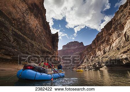Rafts float down the Colorado river in the Grand Canyon National Park; Arizona, United States of America View Large Photo Image Stock Image - Rafts float down the Colorado river in the Grand Canyon National Park; Arizona, United States of America. Fotosearch