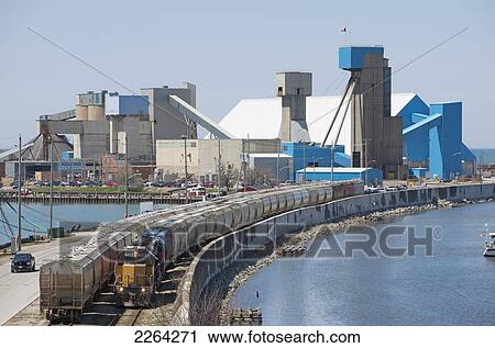 Stock Image - Railcars outside salt mine; goderich ontario canada. Fotosearch