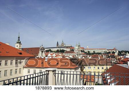 Stock Image - Railing And Prague Cityscape. Fotosearch