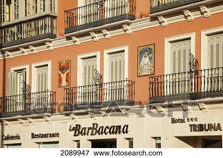 Stock Photo - Railings Outside Doors On The Second And Third Floors Of A Building; Malaga, Andalusia, Spain. Fotosearch
