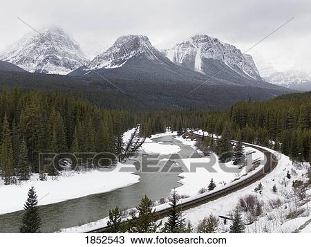 Railroad Through Canadian Rockies, Banff, Alberta, Canada View Large Photo Image Stock Image - Railroad Through Canadian Rockies, Banff, Alberta, Canada. Fotosearch