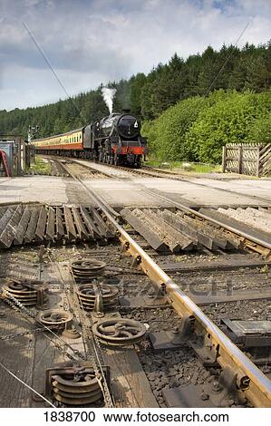Stock Image - Railroad Track Mechanism; Goathland, North Yorkshire, England, Uk. Fotosearch