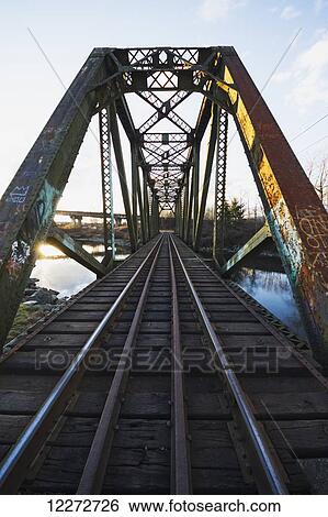 Railway bridge over the Seymour River, North Vancouver, British Columbia, Canada View Large Photo Image Stock Photograph - Railway bridge over the Seymour River, North Vancouver, British Columbia, Canada. Fotosearch