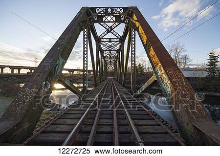 Railway bridge over the Seymour River, North Vancouver, British Columbia, Canada View Large Photo Image Stock Photography - Railway bridge over the Seymour River, North Vancouver, British Columbia, Canada. Fotosearch