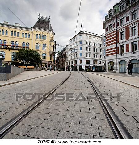 Railway Tracks Along The Road In An Urban Area; Oslo Norway View Large Photo Image Stock Photo - Railway Tracks Along The Road In An Urban Area; Oslo Norway. Fotosearch